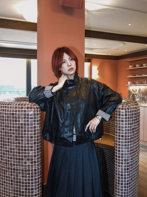 Black Leather Jacket with Plaid Cuffed Sleeves